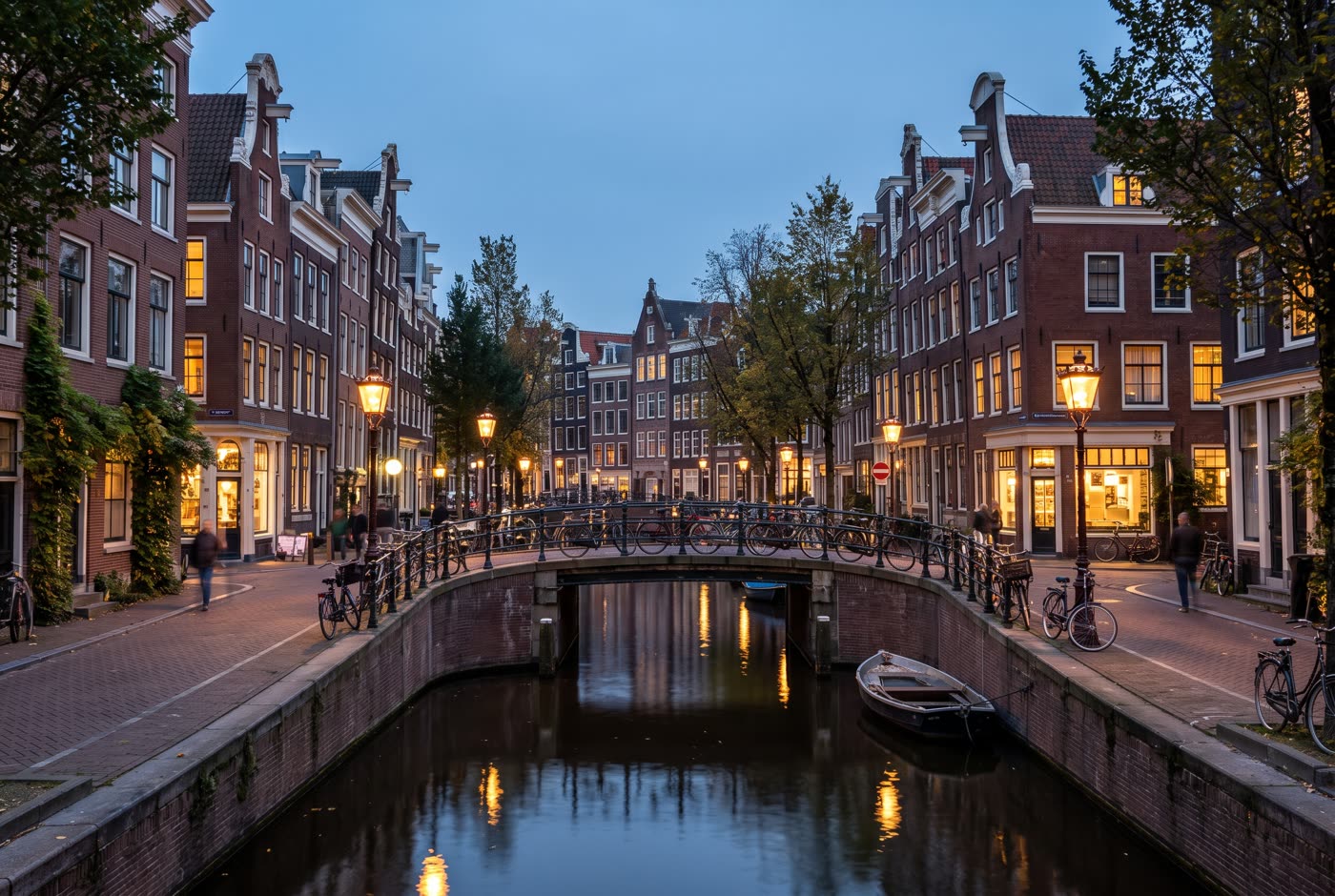 Amsterdam canals at dusk (AI-generated image)